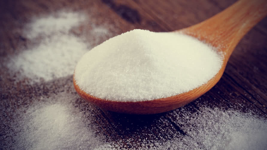 Baking Soda in wooden spoon