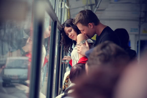 loving couple embraces in the bus