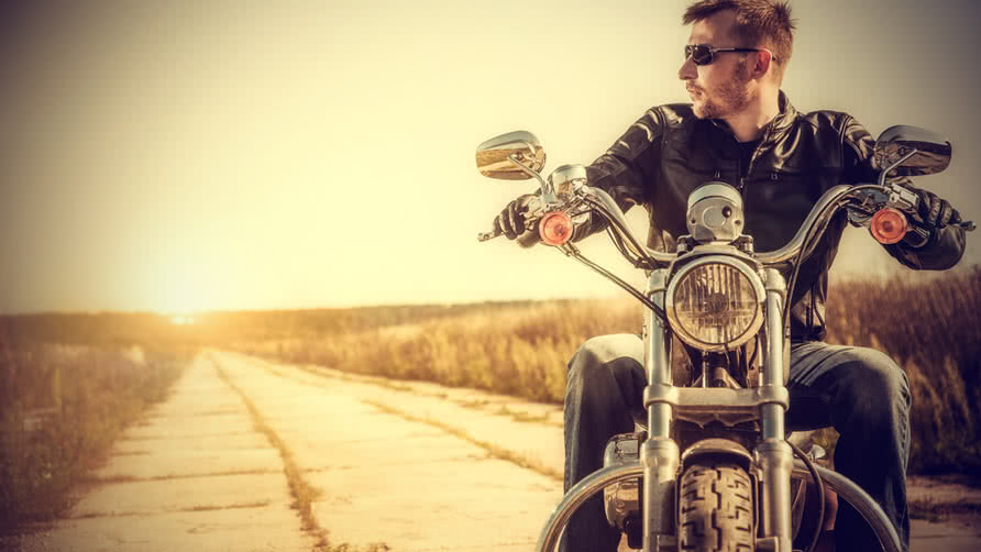 biker man sits on a bike