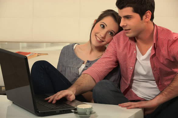 woman and man on laptop