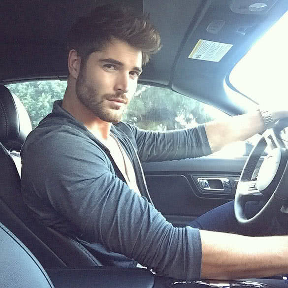 handsome man in his car
