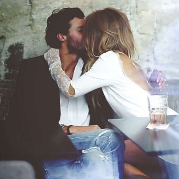 hugging and kissing couple