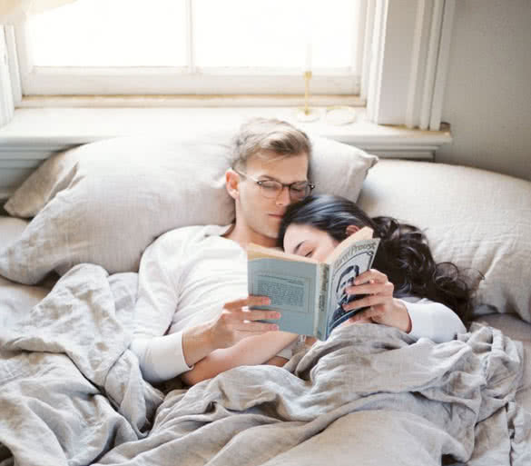 woman-sleeping-and-man-reading-a-book.jpg