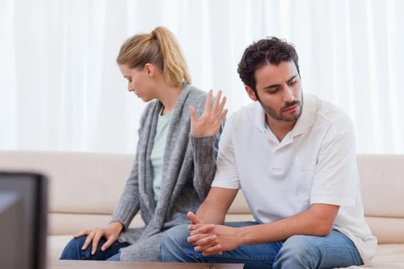 Woman-being-mad-at-her-husband-in-their-living-room