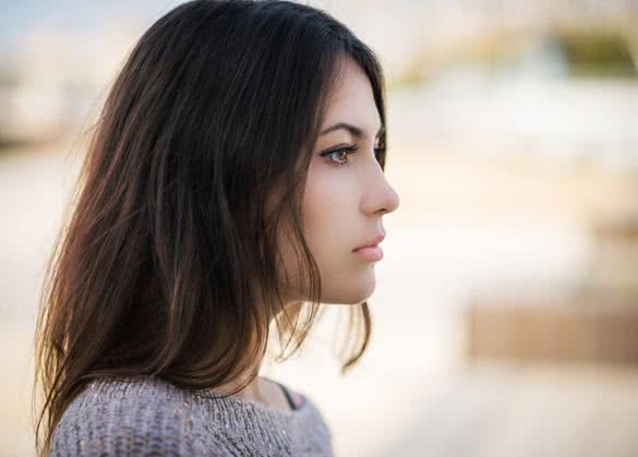 beautiful-woman-standing-and-looking