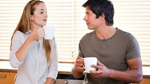 couple-having-coffee-and-talking