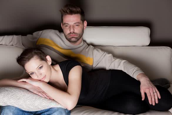 couple-watching-TV-at-home