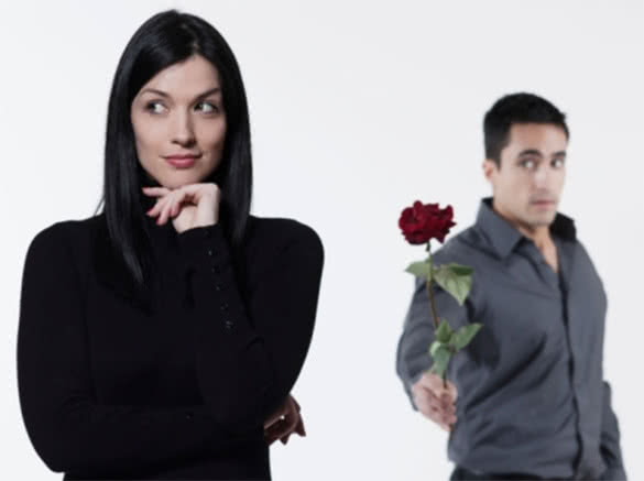 man-chasing-woman-with-flower