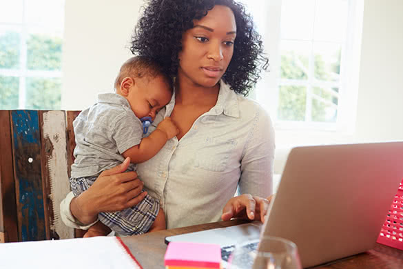 mother-with-baby-working-at-home