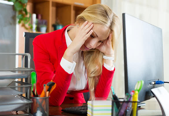 tired-blonde-woman-sitting-at-the-computer