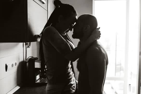 handsome man and beautiful woman posing in the kitchen