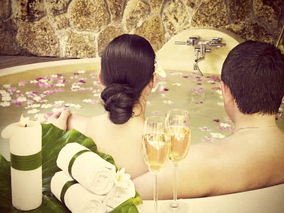 Loving couple relaxed in the bath
