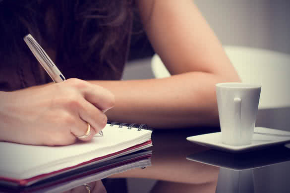 Business Woman Writing in coffee
