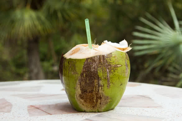 Coconut water is placed on the table and refreshment