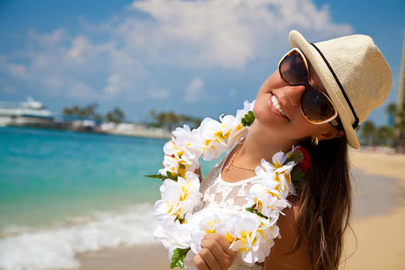 Hawaii woman with flower lei garland of white plumeria