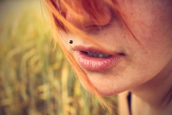 Woman With Piercing Above Upper Lip