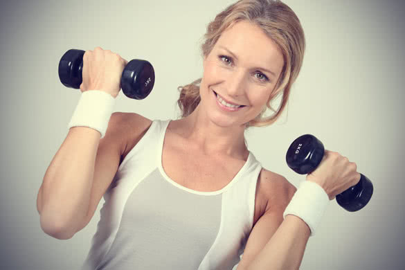 Woman lifting weights 12