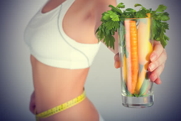 Weight loss woman with carrots