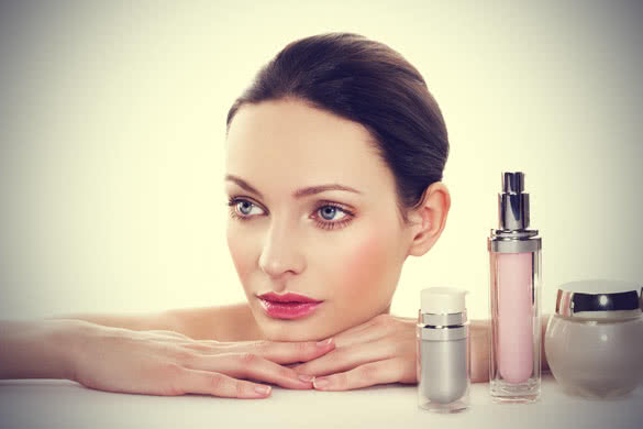 Woman with Skincare products