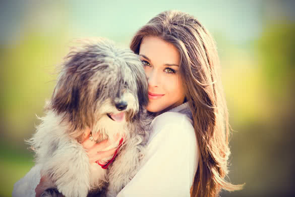 beautiful young woman with her dog