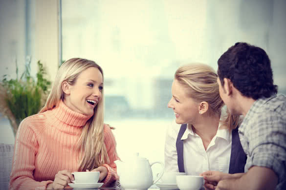 How to Tell If a Guy Likes You - Friends chatting in coffee shop