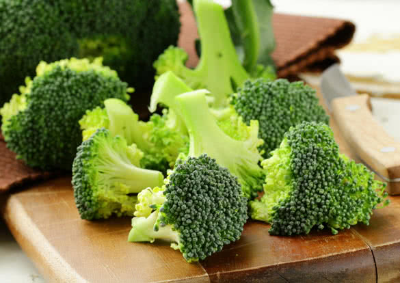 Fresh broccoli on a wooden board