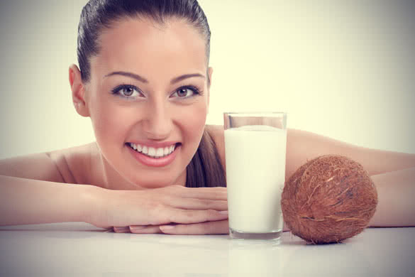 Smiling Woman and Coconut Milk Glass