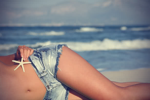 beach woman sunbathing on vactions