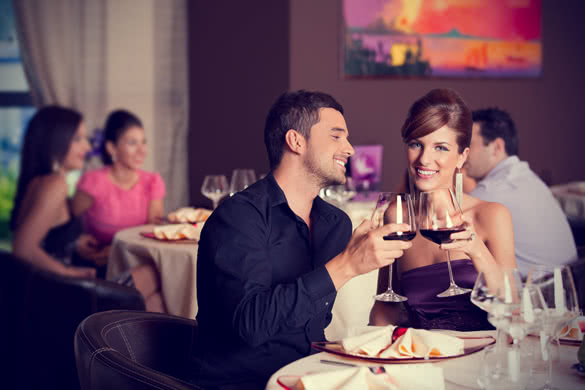 lovely couple on dinner drinking wine