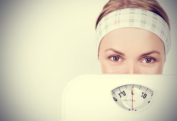 Female Eyes and Weight Scale