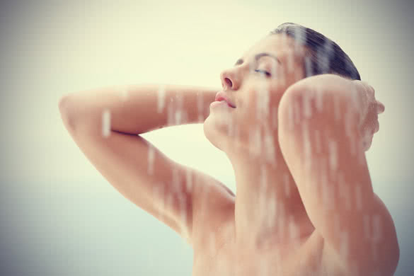 Woman having cold showering