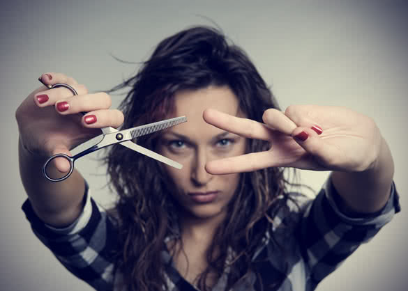 beautiful girl with scissors