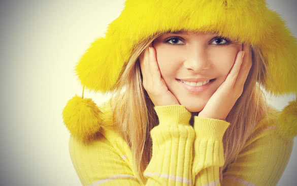 yellow sweater and yellow cap