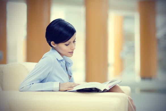 Business Woman Reading Book