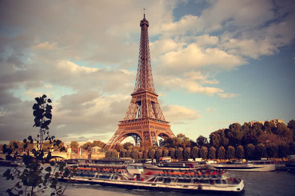eiffel tower with boat in paris