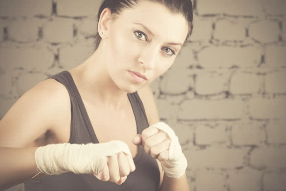 beautiful boxer girl with white bandage on hands