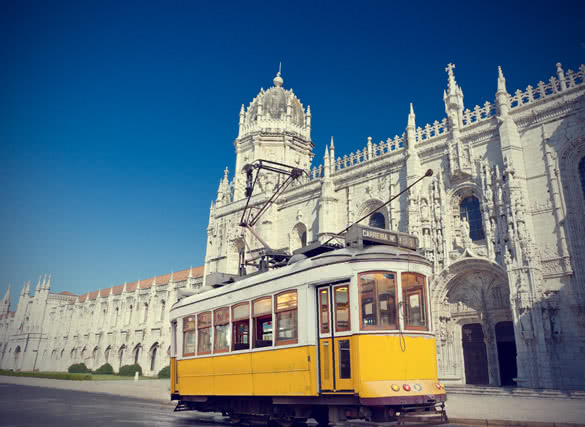 historic classic yellow tram of lisbon built partially of wood