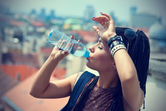 Female drinking Water Outdoor