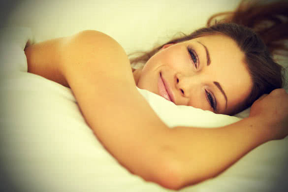 beautiful smiling girl in bed
