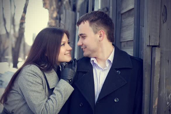 smiling young couple in winter