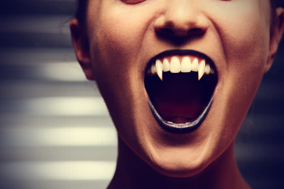 woman with vampire teeth
