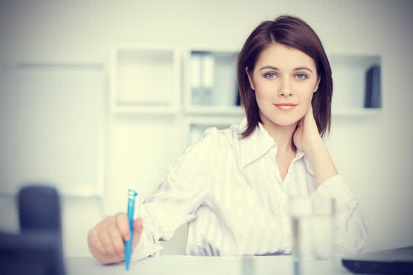 relaxed young business woman at the office