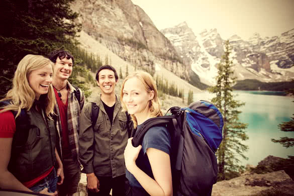 A group of friends on a hiking  camping trip in the mountains