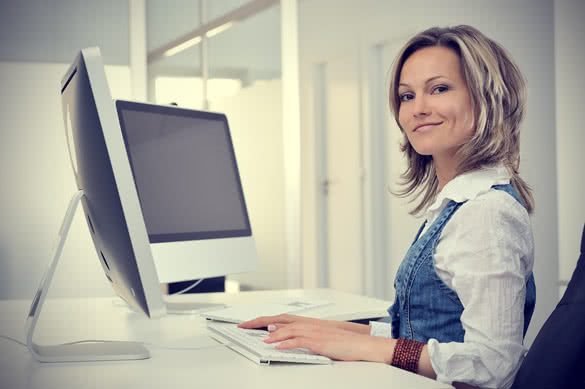 woman with two computers