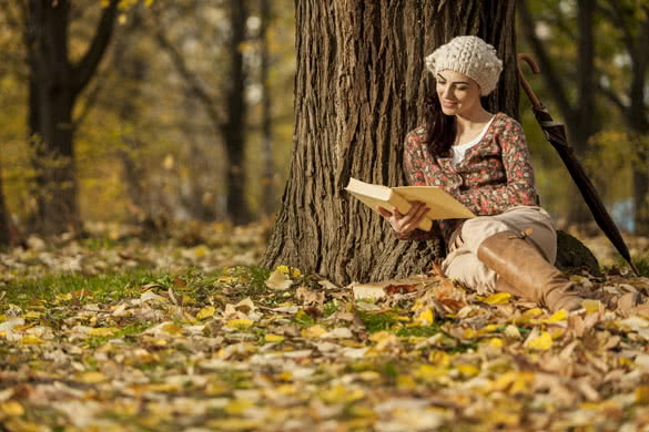 reading book in park