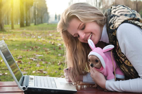 woman with her puppy outdoors