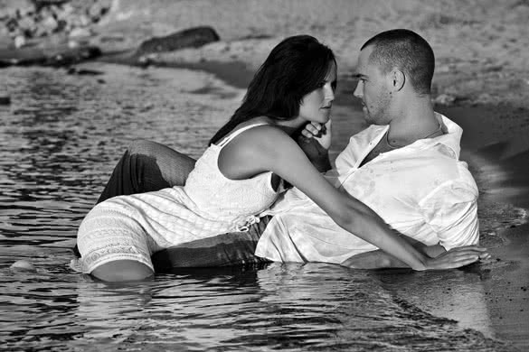 lovely couple in water black and white