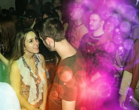 couple flirting in the club