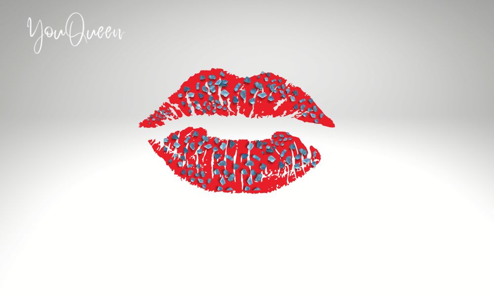 Womans red lips strewed with sugar