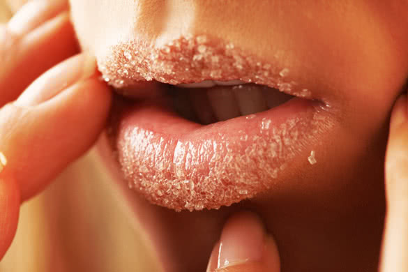 womans lips covered with sugar